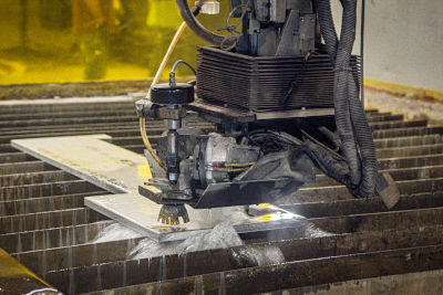 CCDI's waterjet machining a part